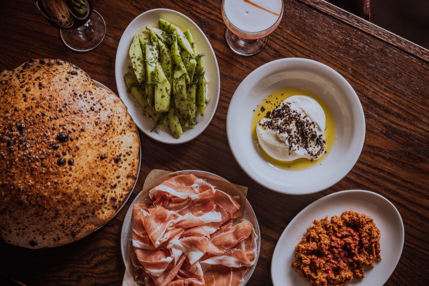 Wood-fired bread, burrata, prosciutto and antipasti at Bar Totti's