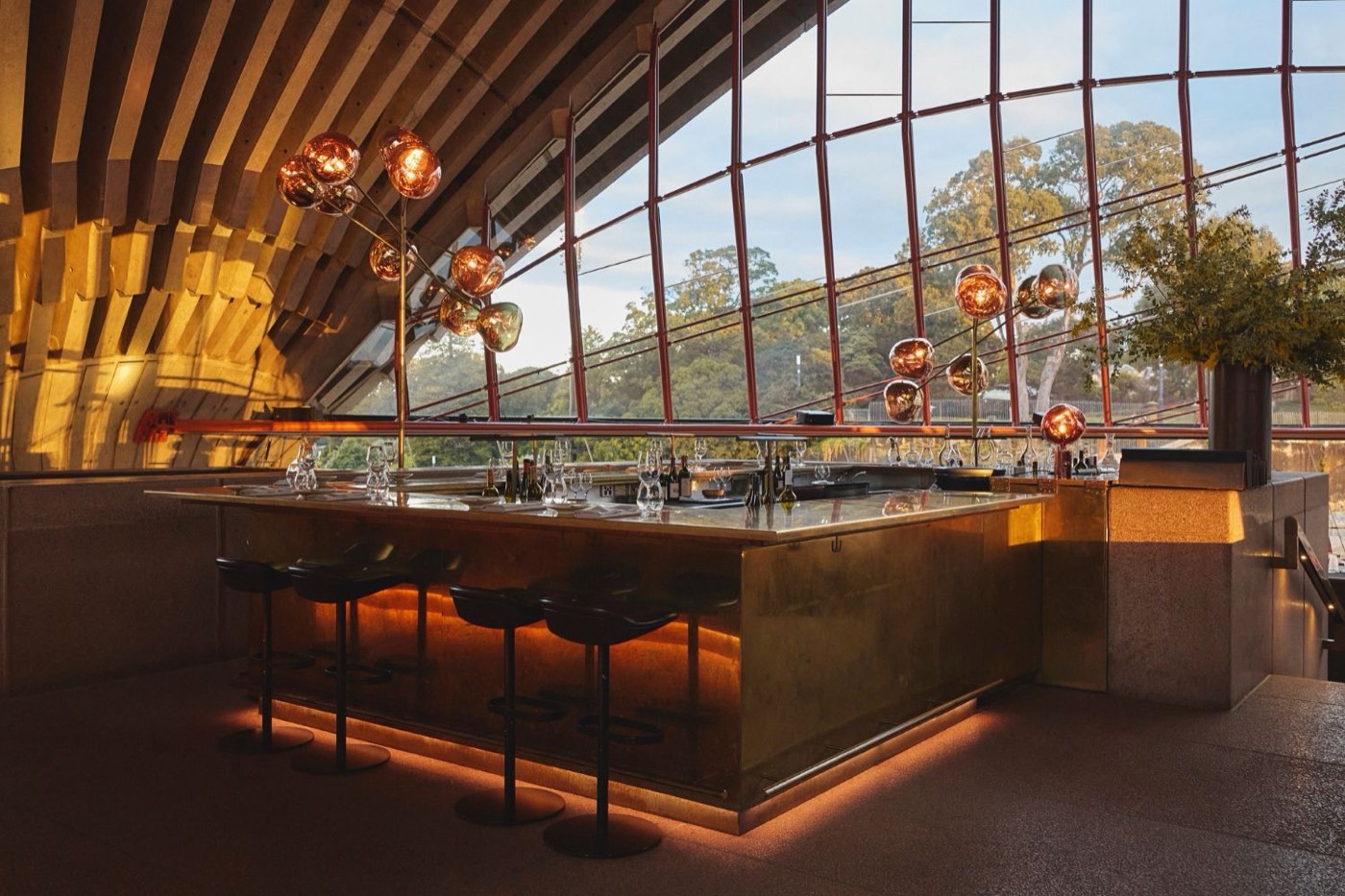 Bennelong's bar beneath the ribbed concrete vaults of the Opera House sail