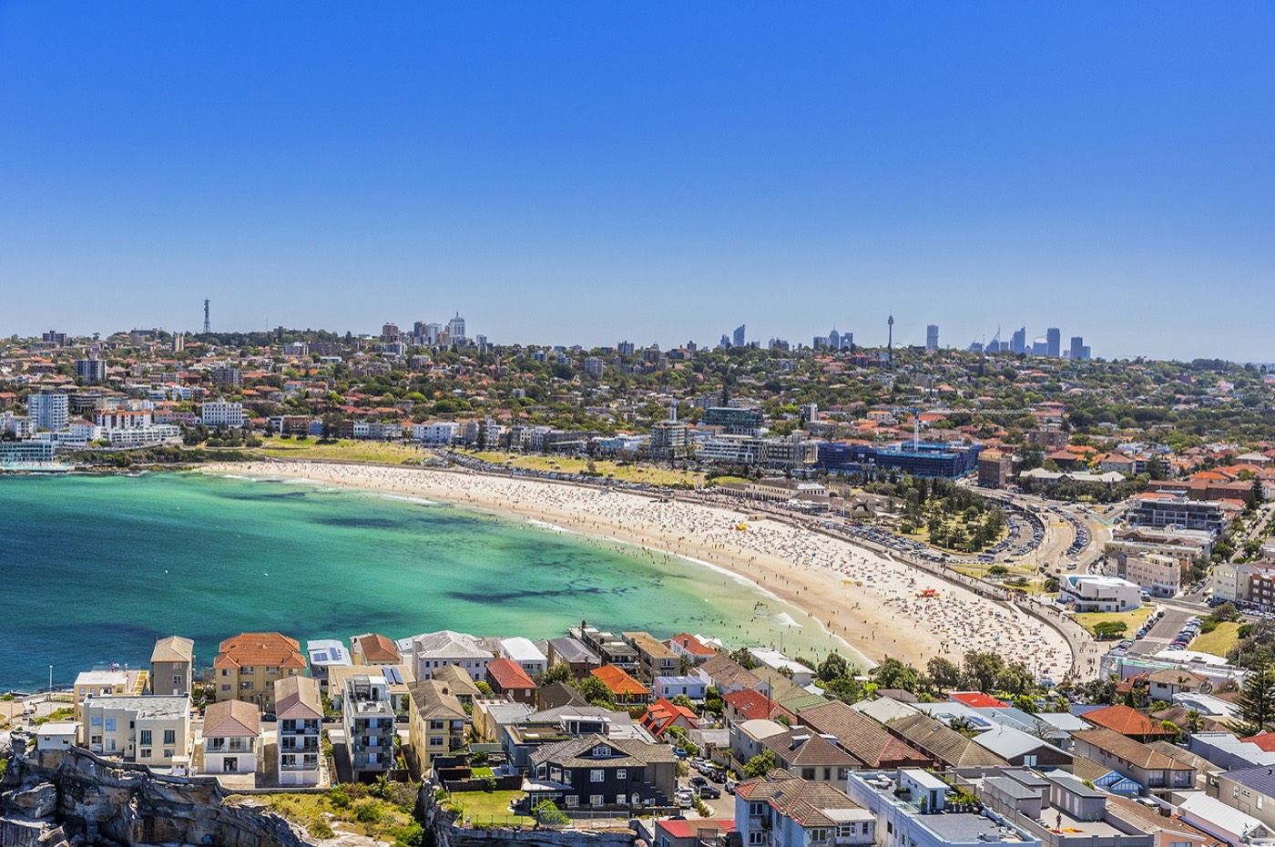 Aerial view of the crescent of Bondi Beach on a sunny day