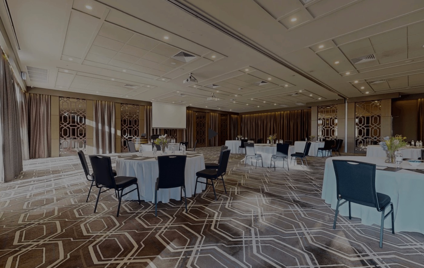 A Château Élan function room set with round tables