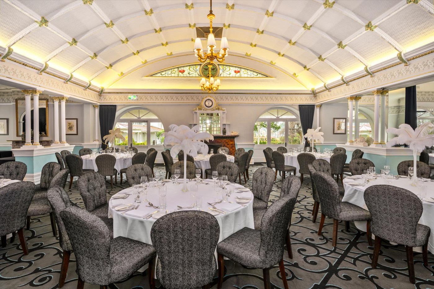 The Hydro Majestic's domed ballroom set with round tables under a chandelier