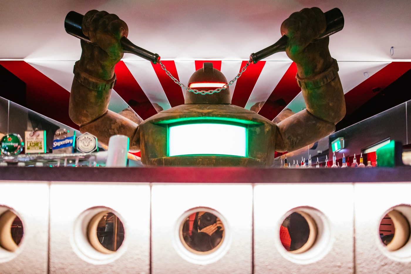 The robot sculpture above the bar at Strike Bowling Darling Harbour