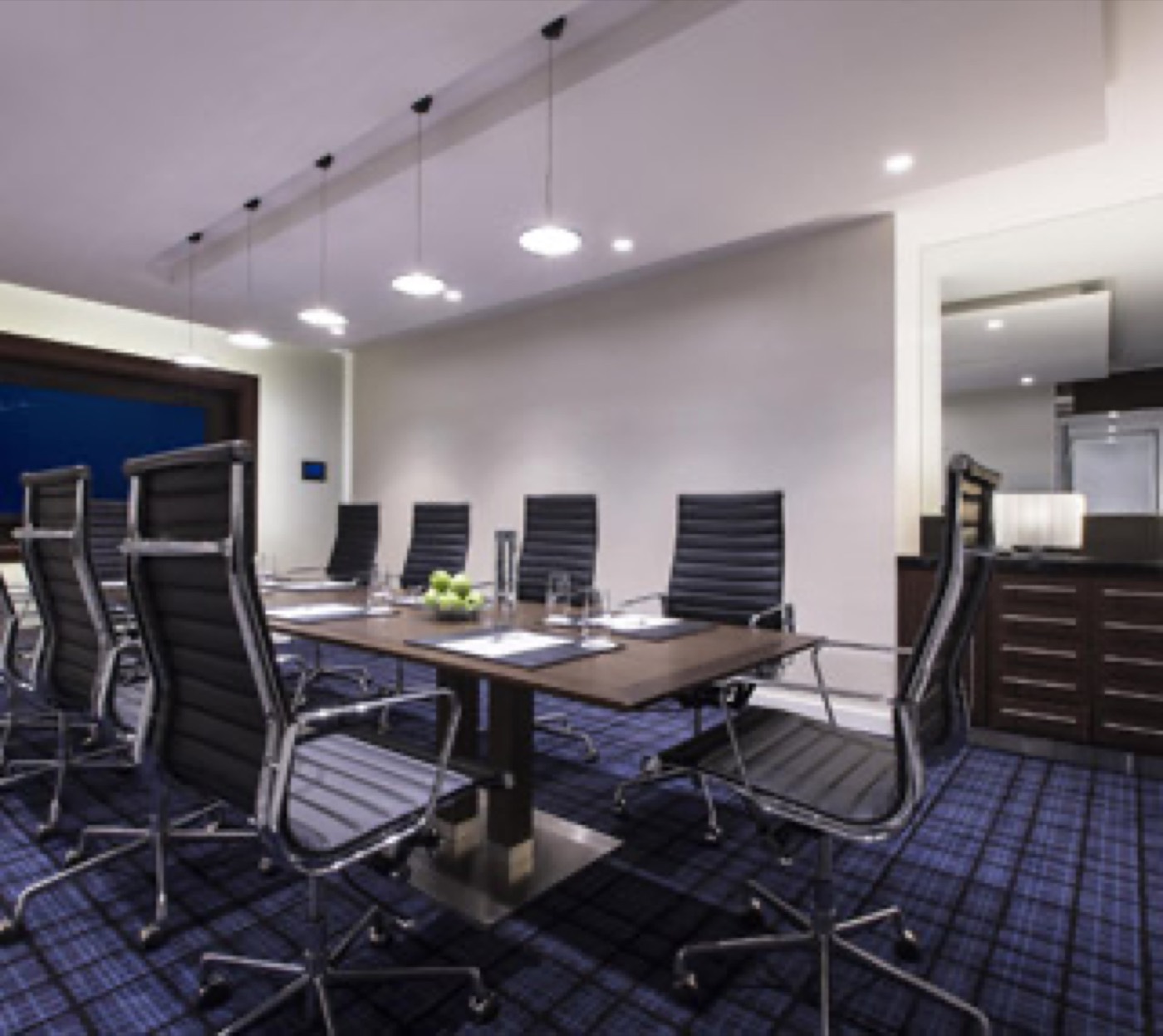 A Swissôtel Sydney meeting room set boardroom-style
