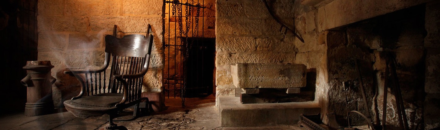 Hand-cut sandstone walls and fireplace inside the Hero of Waterloo