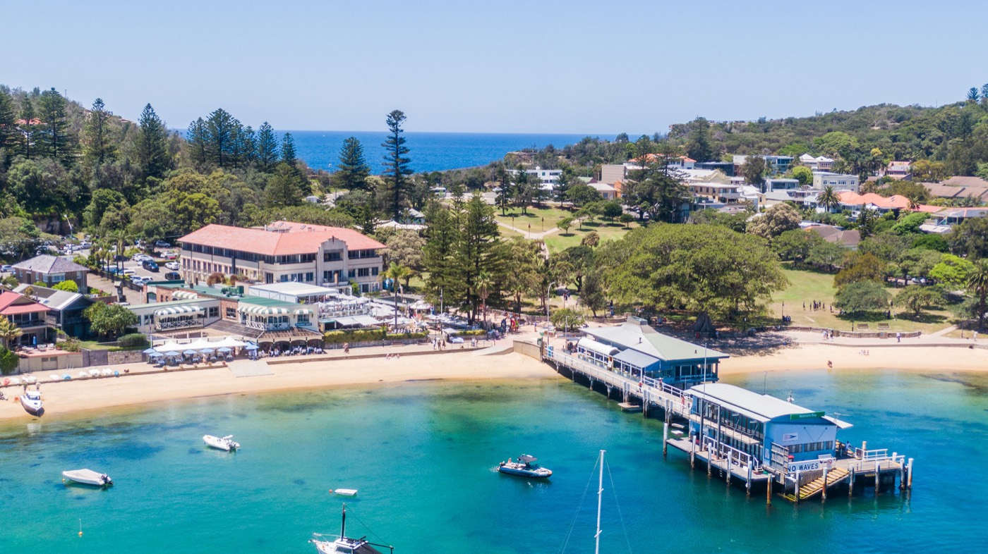 Aerial view of Watsons Bay Hotel beside the beach and ferry wharf