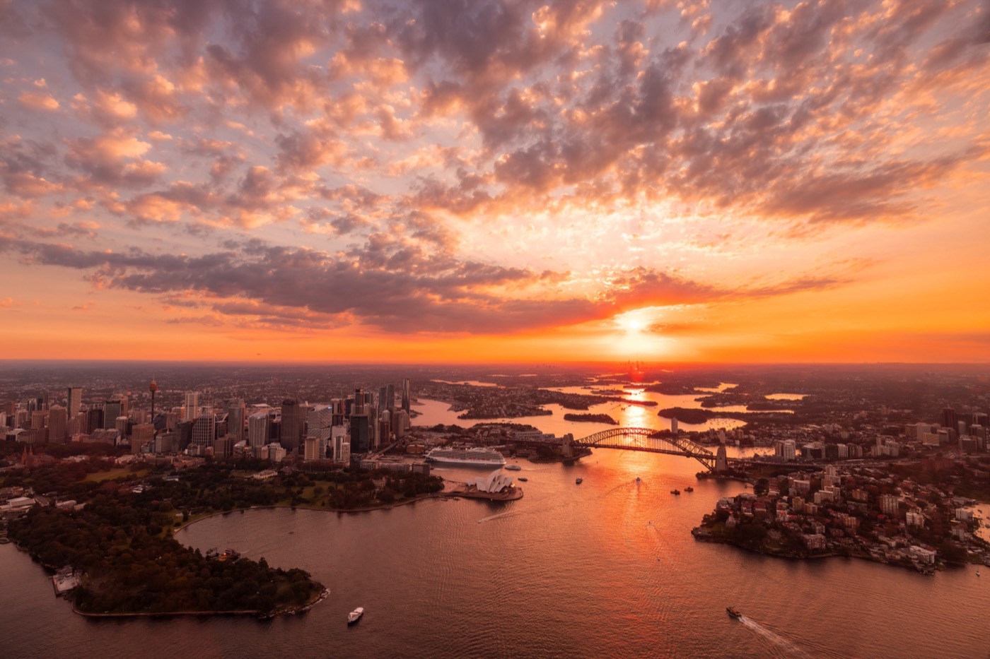 Aerial view of Sydney Harbour and the city at sunset