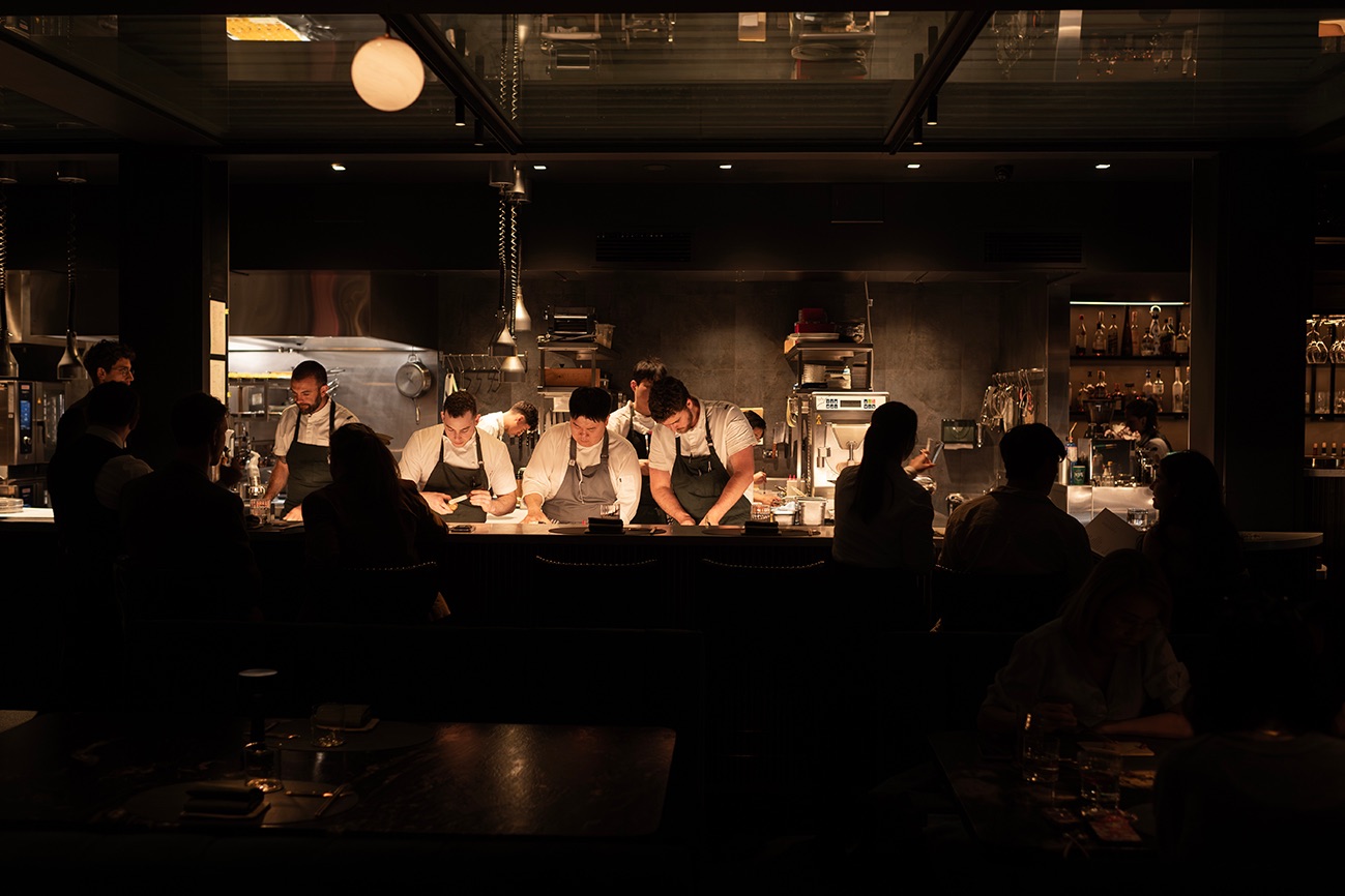 Chefs plating at the open kitchen of LuMi Dining in Pyrmont