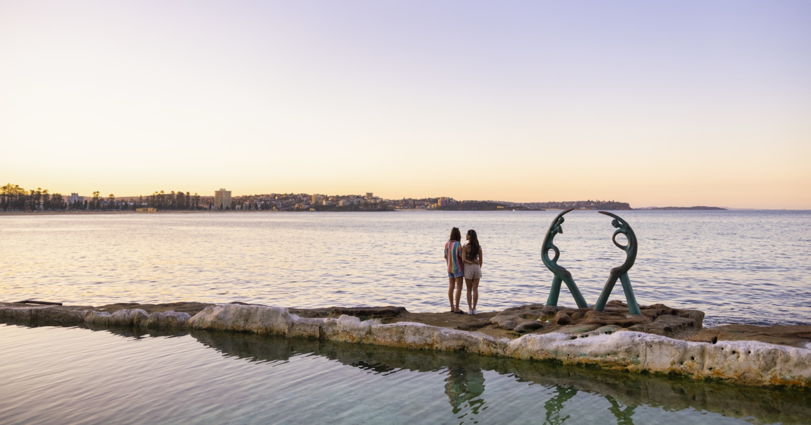 Fairy Bower ocean pool and sculpture at Manly at sunset