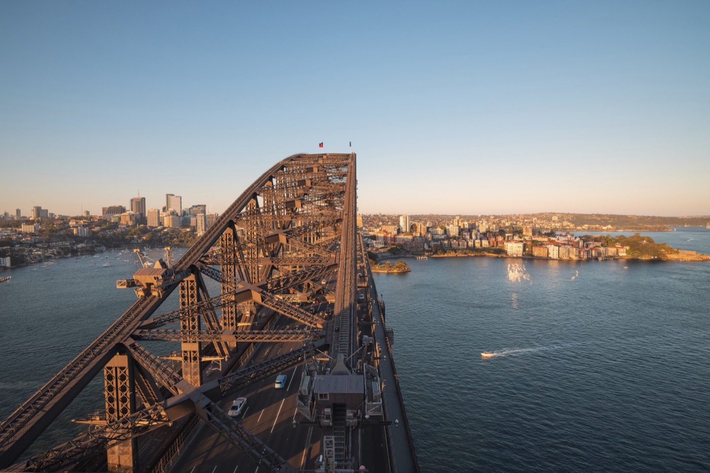 Sydney Harbour Bridge arch seen from above at golden hour