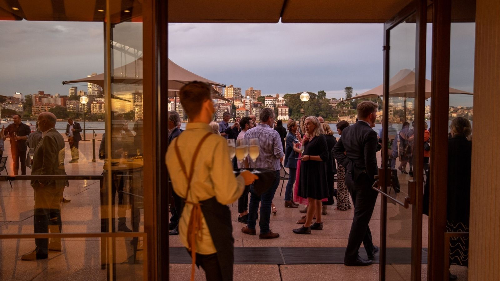 Corporate drinks function on the Yallamundi Rooms terrace at the Sydney Opera House